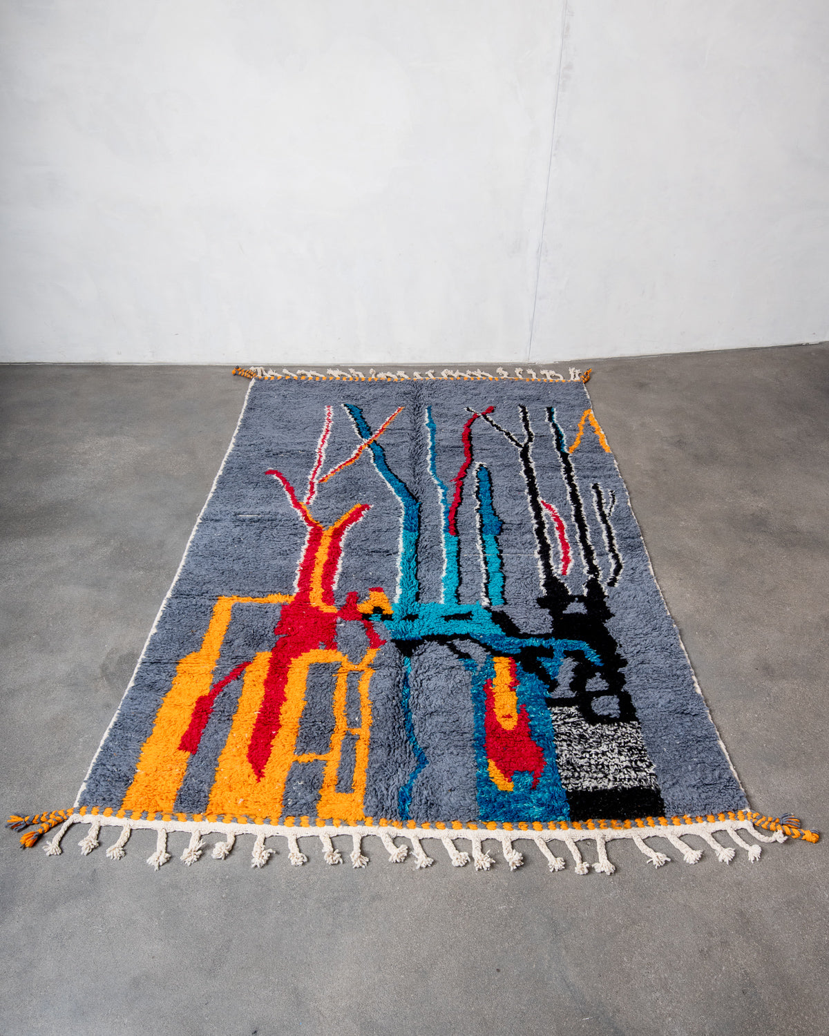 Modern, designer, handcrafted Berber rug from Morocco. Beniourain carpet with beautiful colours and patterns and fluffy wool texture.